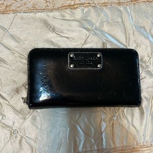 Kate Spade black clutch with 12 card capacity.